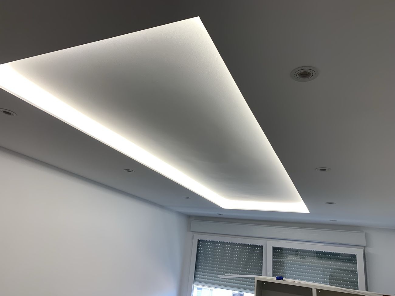 Drywall tray ceiling with hidden LED cove lighting
